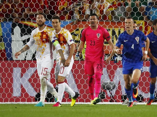 Croatia's Danijel Subasic reacts after saving a penalty taken by from Spain's Sergio Ramos. (Reuters Photo) Croatia's Danijel Subasic reacts after saving a penalty taken by from Spain's Sergio Ramos. (Reuters Photo)