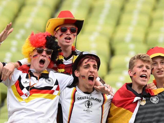 German supporters celebrate their team’s win. (AFP)