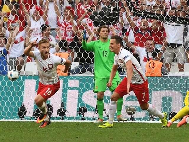 Jakub Blaszczykowski (L) celebrates after scoring. (AFP)