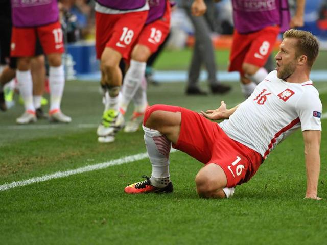 Jakub Blaszczykowski celebrates after scoring. (AFP)