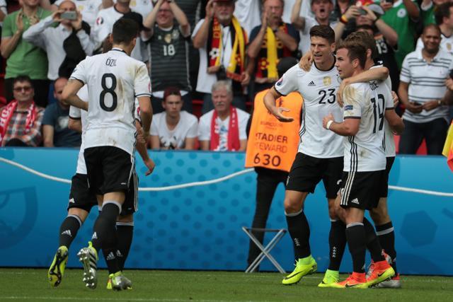 Germany's forward Mario Gomez celebrates scoring the opening goal in the Euro 2016 group C football match against Northern Ireland. (AFP Photo)