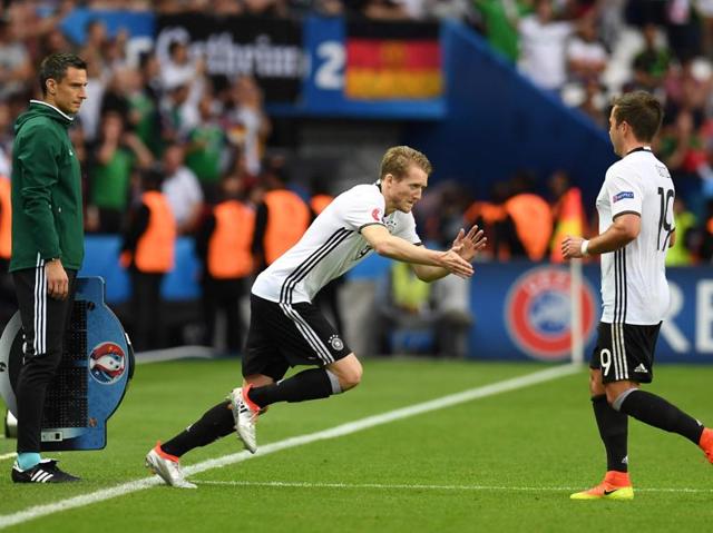 German forward Mario Goetze (R) is substituted by Andre Schuerrle. (AFP)