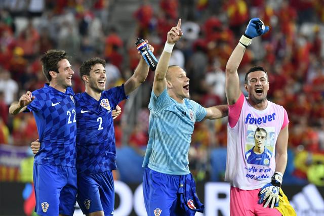 Croatia's players celebrate their victory during the Euro 2016 group D football match between Croatia and Spain at the Matmut Atlantique stadium in Bordeaux. (AFP Photo) Croatia's players celebrate their victory during the Euro 2016 group D football match between Croatia and Spain at the Matmut Atlantique stadium in Bordeaux. (AFP Photo)