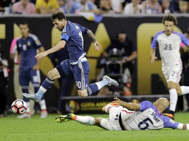 Argentina's Lionel Messi (10) chases the ball over United States' John Brooks (6) during a Copa America Centenario semifinal match. (AP Photo) Argentina's Lionel Messi (10) chases the ball over United States' John Brooks (6) during a Copa America Centenario semifinal match. (AP Photo)
