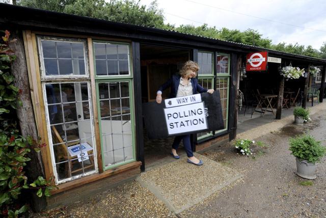Sue Hopgood polling clerk for Maldon District Council prepares the polling station set up at the Little Braxted Bakery in Little Braxted in Britain on June 23, 2016. (AP) Sue Hopgood polling clerk for Maldon District Council prepares the polling station set up at the Little Braxted Bakery in Little Braxted in Britain on June 23, 2016. (AP)