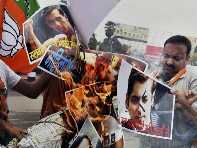 BJP activists burning photos of Bollywood actor Salman Khan during a protest over his controversial rape remarks in Patna on Tuesday. (PTI) BJP activists burning photos of Bollywood actor Salman Khan during a protest over his controversial rape remarks in Patna on Tuesday. (PTI)
