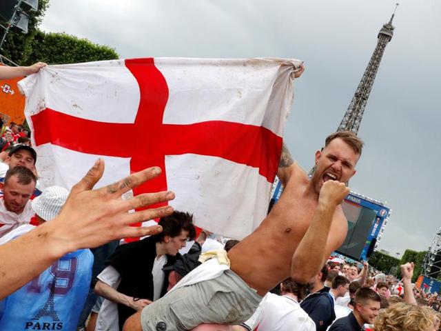 England fans react after their team won against Wales as they gathered to watch the England vs Wales Euro 2016 Group B football match in Paris. (Reuters Photo) 