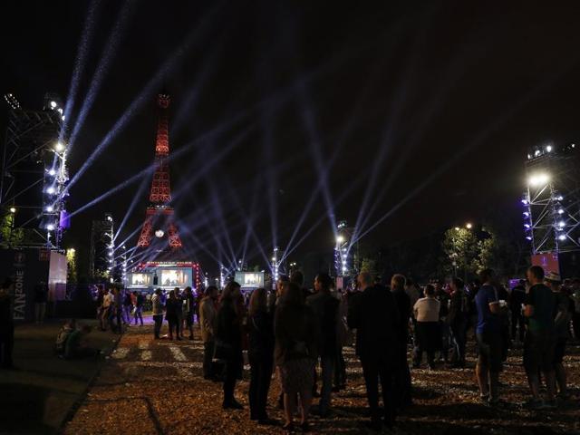 People watch the Euro 2016 group D football match between Croatia and Spain at the fan zone near the Eiffel Tower in Paris. (AFP Photo) 