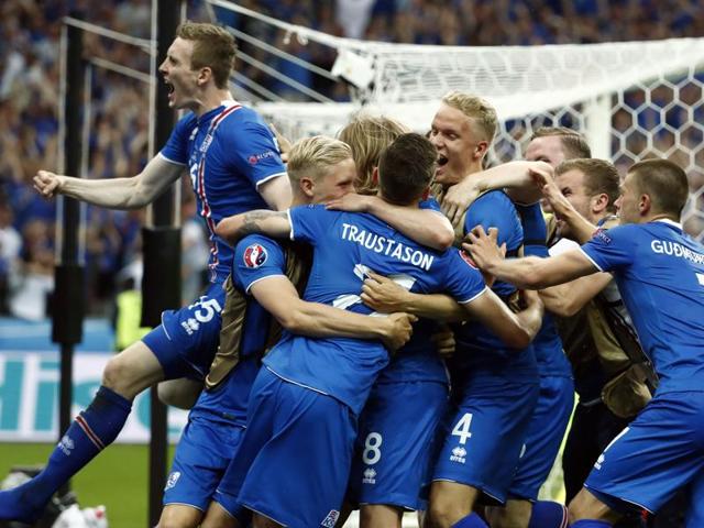 Iceland's players celebrate after the Euro 2016 group F football match between Iceland and Austria at the Stade de France stadium in Saint-Denis, near Paris. (AFP) Iceland's players celebrate after the Euro 2016 group F football match between Iceland and Austria at the Stade de France stadium in Saint-Denis, near Paris. (AFP)