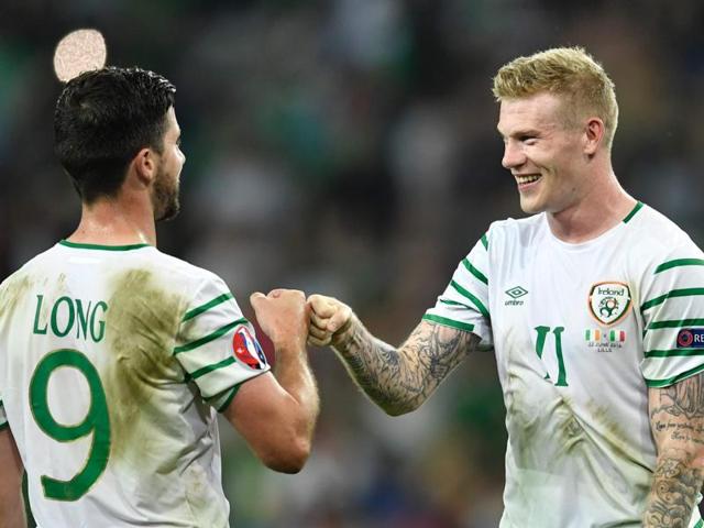 Ireland's forward Shane Long (L) and Ireland's midfielder James McClean react after the Euro 2016 group E football match between Italy and Ireland. (AFP photo) Ireland's forward Shane Long (L) and Ireland's midfielder James McClean react after the Euro 2016 group E football match between Italy and Ireland. (AFP photo)