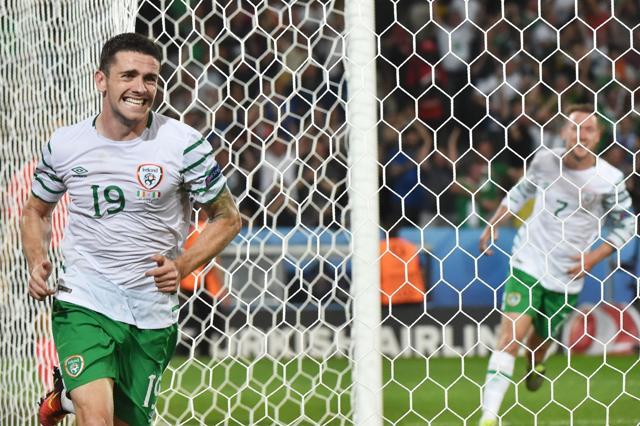 Ireland's midfielder Robert Brady celebrates scoring a goal during the Euro 2016 group E football match. (AFP Photo)