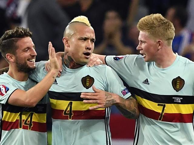 Belgium's midfielder Radja Nainggolan (C) is congratulated by Belgium's forward Dries Mertens. (AFP photo) Belgium's midfielder Radja Nainggolan (C) is congratulated by Belgium's forward Dries Mertens. (AFP photo)