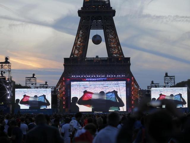 France fans gather to watch the Switzerland vs France Group A football match at the fan zone near the Eiffel Tower in Paris. (Reuters Photo) 