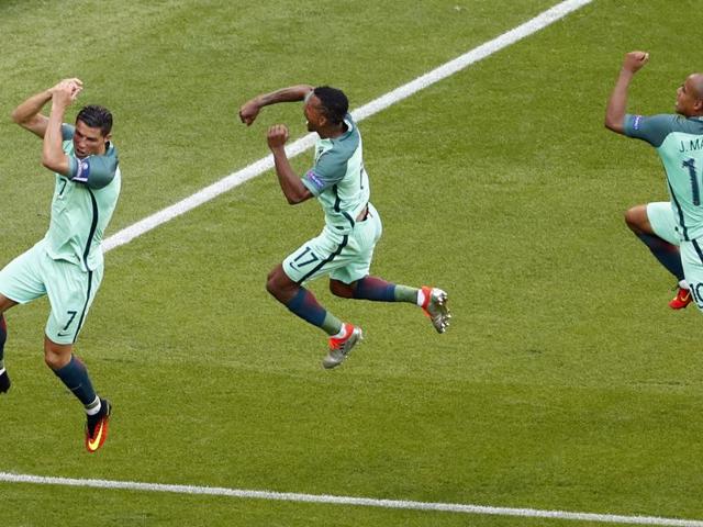 Ronaldo celebrates with Nani and Joao Mario after scoring Portugal’s second goal. (REUTERS) Ronaldo celebrates with Nani and Joao Mario after scoring Portugal’s second goal. (REUTERS)