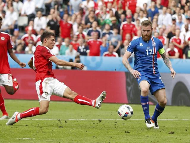 Austria's Alessandro Schoepf scores. (REUTERS)