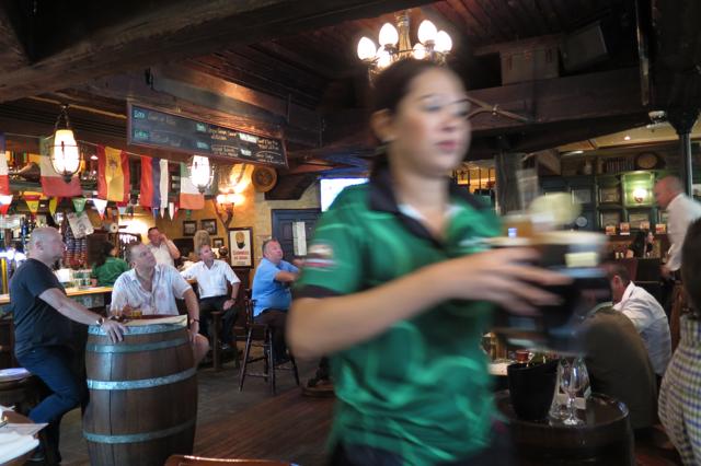 In this June 22 photo, a waitress serves the customers with the beers during lunch time at a restaurant in Dubai, United Arab Emirates. (AP) In this June 22 photo, a waitress serves the customers with the beers during lunch time at a restaurant in Dubai, United Arab Emirates. (AP)