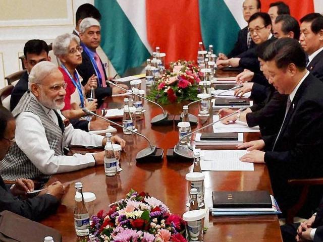 Prime Minister Narendra Modi with Chinese President Xi Jinping during a meeting in Tashkent on Thursday. (PTI Photo) Prime Minister Narendra Modi with Chinese President Xi Jinping during a meeting in Tashkent on Thursday. (PTI Photo)