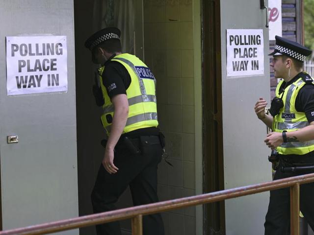 Police arrive to cast their votes in the EU referendum, at Broomhouse Community Hall in Glasgow. (REUTERS) 