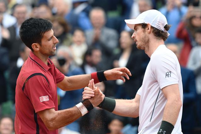 Serbia's Novak Djokovic (L) shakes hands with Britain's Andy Murray. (AFP Photo) Serbia's Novak Djokovic (L) shakes hands with Britain's Andy Murray. (AFP Photo)
