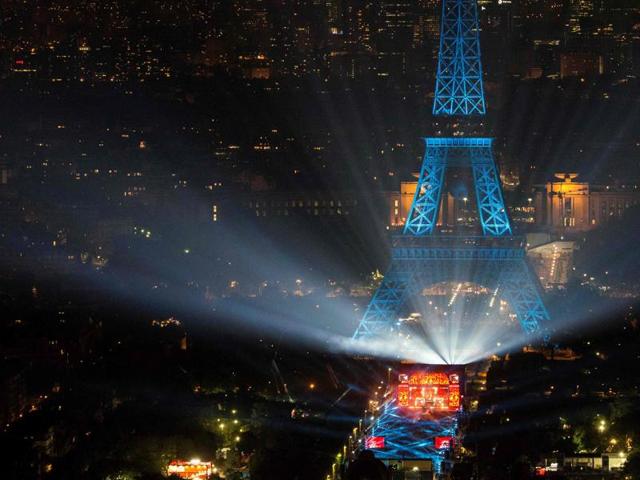 The opening concert of the Paris fan zone on Champs de Mars by the Eiffel Tower, in Paris. (AFP Photo) 