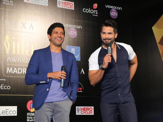 Farhan Akhtar and Shahid Kapoor share a candid moment during the IIFA press meet in Spain (IIFA) 