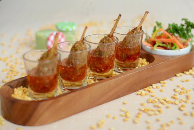 The deep-fried nuggets of the veg kulfi kebab had a crunchy outside and a spicy, creamy interior
