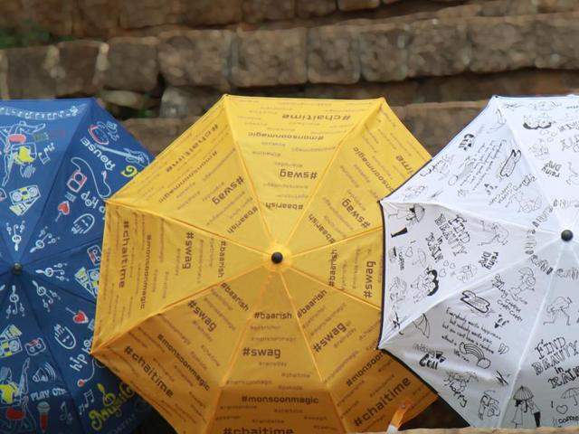 Social media junkies can flash umbrellas with rain-related hashtags, such as #ChaiTime and #Baarish. Social media junkies can flash umbrellas with rain-related hashtags, such as #ChaiTime and #Baarish.