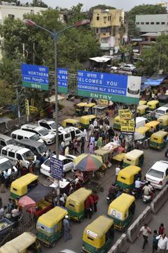 The two lane parking which is on the side of the road adds to the traffic chaos here.(Tribhuwan Sharma / HT Photo)