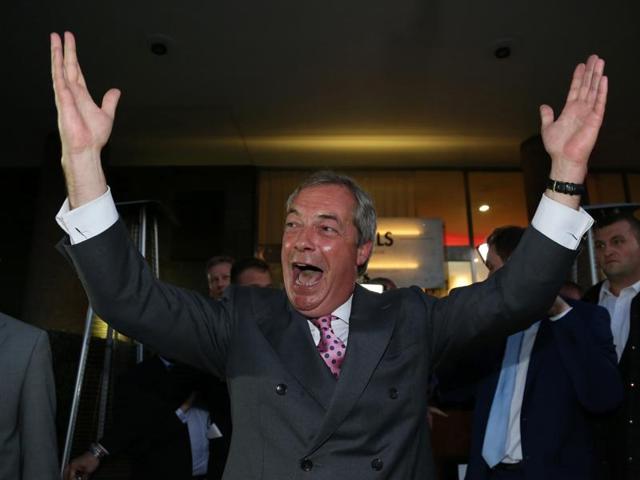 Leader of the United Kingdom Independence Party (UKIP), Nigel Farage reacts outside the Leave EU referendum party at Millbank Tower in central London as the results are declared. (AFP)