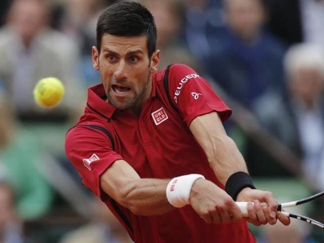 A file photo of Novak Djokovic holding his US Open trophy. (AP Photo) A file photo of Novak Djokovic holding his US Open trophy. (AP Photo)