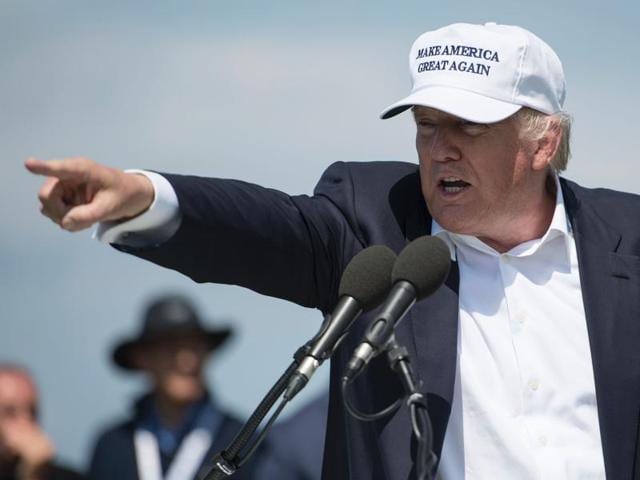 Presumptive Republican presidential nominee Donald Trump delivers a speech as he officially opens his Trump Turnberry hotel and golf resort in Turnberry, Scotland.(AFP Photo)