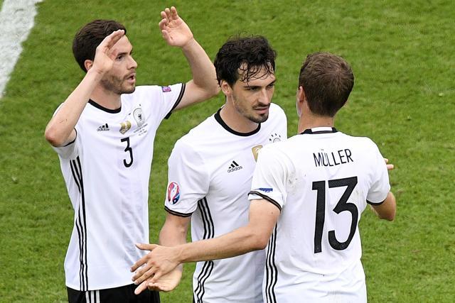 Germany's defender Jonas Hector, Germany's defender Mats Hummels and Germany's midfielder Thomas Mueller celebrate after the Euro 2016 group C football match against Northern Ireland. (AFP Photo) Germany's defender Jonas Hector, Germany's defender Mats Hummels and Germany's midfielder Thomas Mueller celebrate after the Euro 2016 group C football match against Northern Ireland. (AFP Photo)