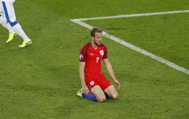 England's Harry Kane sits on the pitch during the Euro 2016 Group B football match between Slovakia and England at the Geoffroy Guichard stadium in Saint-Etienne, France. (AP Photo)