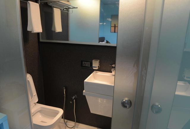 The washroom area of a portable hotel room. (AFP)