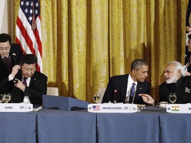 File photo of Chinese President Xi Jinping, US President Barack Obama and Indian Prime Minister Narendra Modi at the White House. The US is supporting India’s bid for NSG membership but China is against it.(AFP)