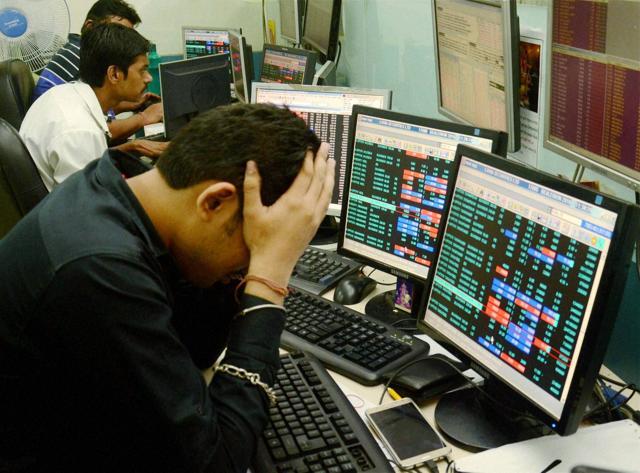 Share brokers react to falling stock prices following the Brexit vote. (PTI Photo) Share brokers react to falling stock prices following the Brexit vote. (PTI Photo)