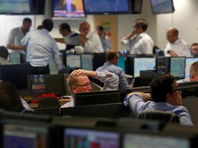 Traders from BGC, a global brokerage company in London's Canary Wharf financial centre react as European stock markets open early June 24, 2016 after Britain voted to leave the European Union in the Brexit referendum. (REUTERS) Traders from BGC, a global brokerage company in London's Canary Wharf financial centre react as European stock markets open early June 24, 2016 after Britain voted to leave the European Union in the Brexit referendum. (REUTERS)