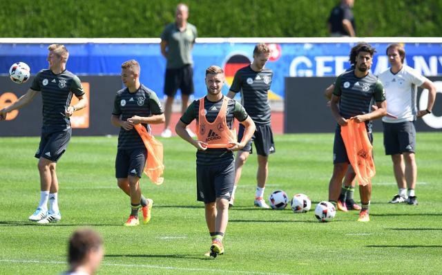 Germany's midfielder Skodran Mustafi warms up during a training session at their training grounds in Evian . (AFP)