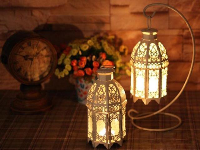 Lanterns: Lanterns having classic shape brings elegance to any space, indoors or outdoors. Try hanging one over your dining table and feel the difference. Lanterns outdoors will give your guests, friends a good impression and a positive vibe when they come into your homes. (Pinterest) Lanterns: Lanterns having classic shape brings elegance to any space, indoors or outdoors. Try hanging one over your dining table and feel the difference. Lanterns outdoors will give your guests, friends a good impression and a positive vibe when they come into your homes. (Pinterest)