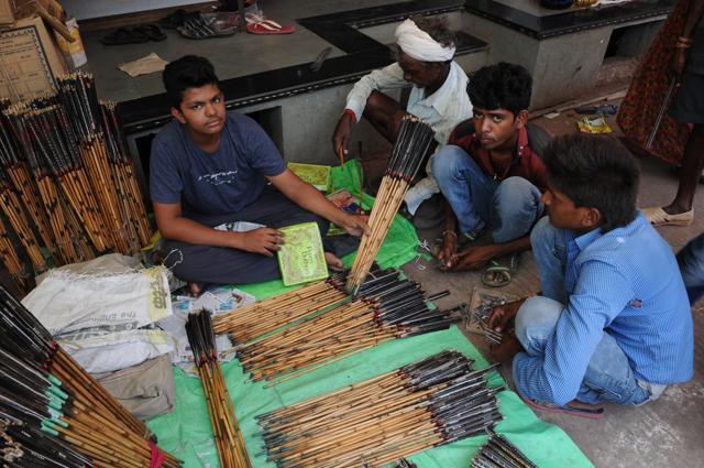 Bows and arrows on sale at a local market in Jobat area of Alirajpur district. (Praveen Bajpai/HT) Bows and arrows on sale at a local market in Jobat area of Alirajpur district. (Praveen Bajpai/HT)