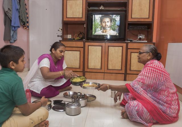 Vatsala Thackeray sits down to dinner with her daughter and grandson — minus their favourite tomato chutney. As prices have risen over three years, the family has stopped their annual visits to their village in coastal Maharashtra. ‘We don’t even go out together within the city now,’ says Vatsala. (Satish Bate/HT PHOTO) Vatsala Thackeray sits down to dinner with her daughter and grandson — minus their favourite tomato chutney. As prices have risen over three years, the family has stopped their annual visits to their village in coastal Maharashtra. ‘We don’t even go out together within the city now,’ says Vatsala. (Satish Bate/HT PHOTO)
