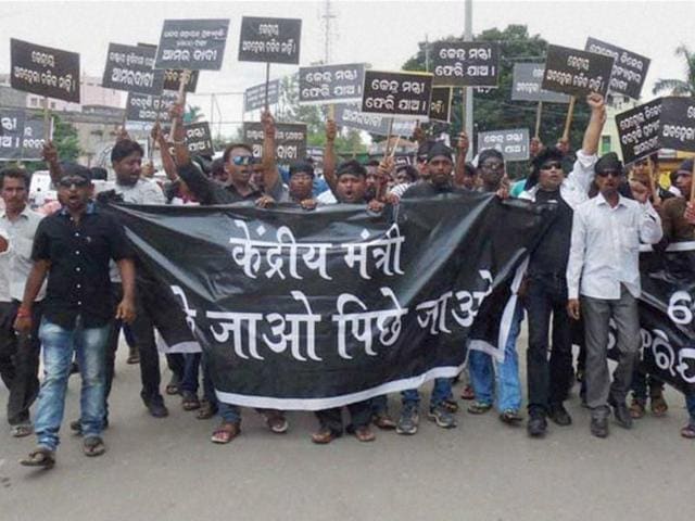 Biju Janata Dal members show black flags to Union ministers at Baragarh in Sambalpur district. (PTI)