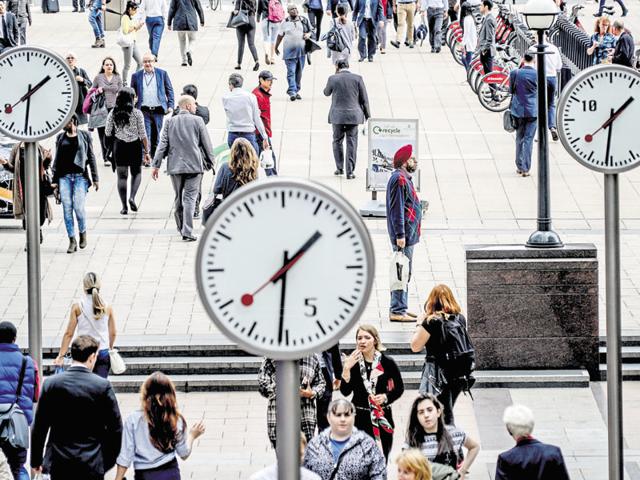 Clocks in the Canary Wharf district of London, June 23, 2016. Britons voted on Thursday on whether to leave the European Union or stay. (Andrew Testa/The New York Times) (NYT) Clocks in the Canary Wharf district of London, June 23, 2016. Britons voted on Thursday on whether to leave the European Union or stay. (Andrew Testa/The New York Times) (NYT)