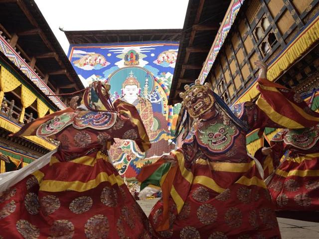 Monks perform traditional mask dance, a physical manifestation of Guru Padmasambhava’s life. (Gurinder Osan/HT PHOTO)