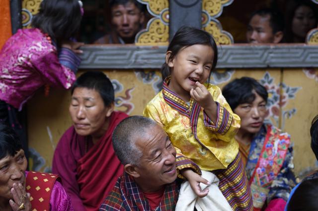Dressed in traditional Bhutanese attire, a young girl participates in the festivities. (Gurinder Osan/HT PHOTO) Dressed in traditional Bhutanese attire, a young girl participates in the festivities. (Gurinder Osan/HT PHOTO)