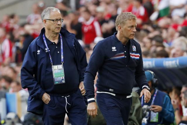 Iceland’s joint coach Heimir Hallgrimsson, right, after their historic 2-1 win over Austria sent the country into the last 16. (REUTERS)