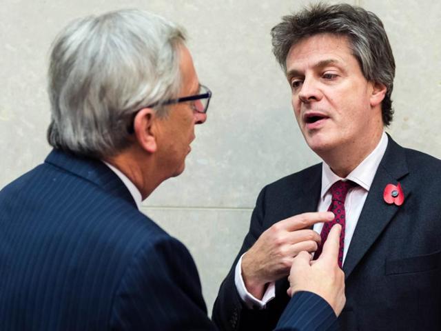 European Commission President Jean-Claude Juncker, left, talks with EU Commissioner for Financial Stability, Financial Services and Capital Markets Union Jonathan Hill. (AP File) European Commission President Jean-Claude Juncker, left, talks with EU Commissioner for Financial Stability, Financial Services and Capital Markets Union Jonathan Hill. (AP File)