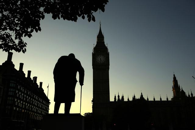 A statue of Winston Churchill is silhouetted against the Houses of Parliament in London, Friday morning, June 24, 2016. (AP Photo) A statue of Winston Churchill is silhouetted against the Houses of Parliament in London, Friday morning, June 24, 2016. (AP Photo)