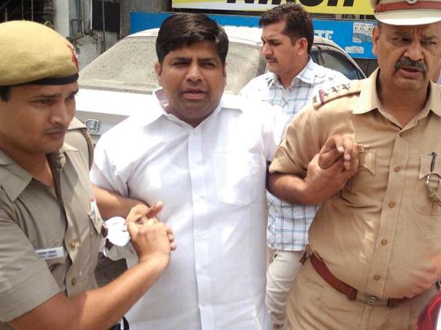 Dinesh Mohaniya, the Sangam Vihar legislator, was detained based on a complaint filed by a group of women who alleged that he had abused them when they approached him with a complaint on a water crisis in their locality. (HT Photo) Dinesh Mohaniya, the Sangam Vihar legislator, was detained based on a complaint filed by a group of women who alleged that he had abused them when they approached him with a complaint on a water crisis in their locality. (HT Photo)