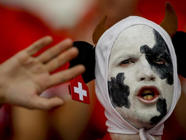 A Swiss fan waits for the start of the Euro 2016 Group A match between Romania and Switzerland at the Parc des Princes stadium in Paris, France. (AP photo) A Swiss fan waits for the start of the Euro 2016 Group A match between Romania and Switzerland at the Parc des Princes stadium in Paris, France. (AP photo)